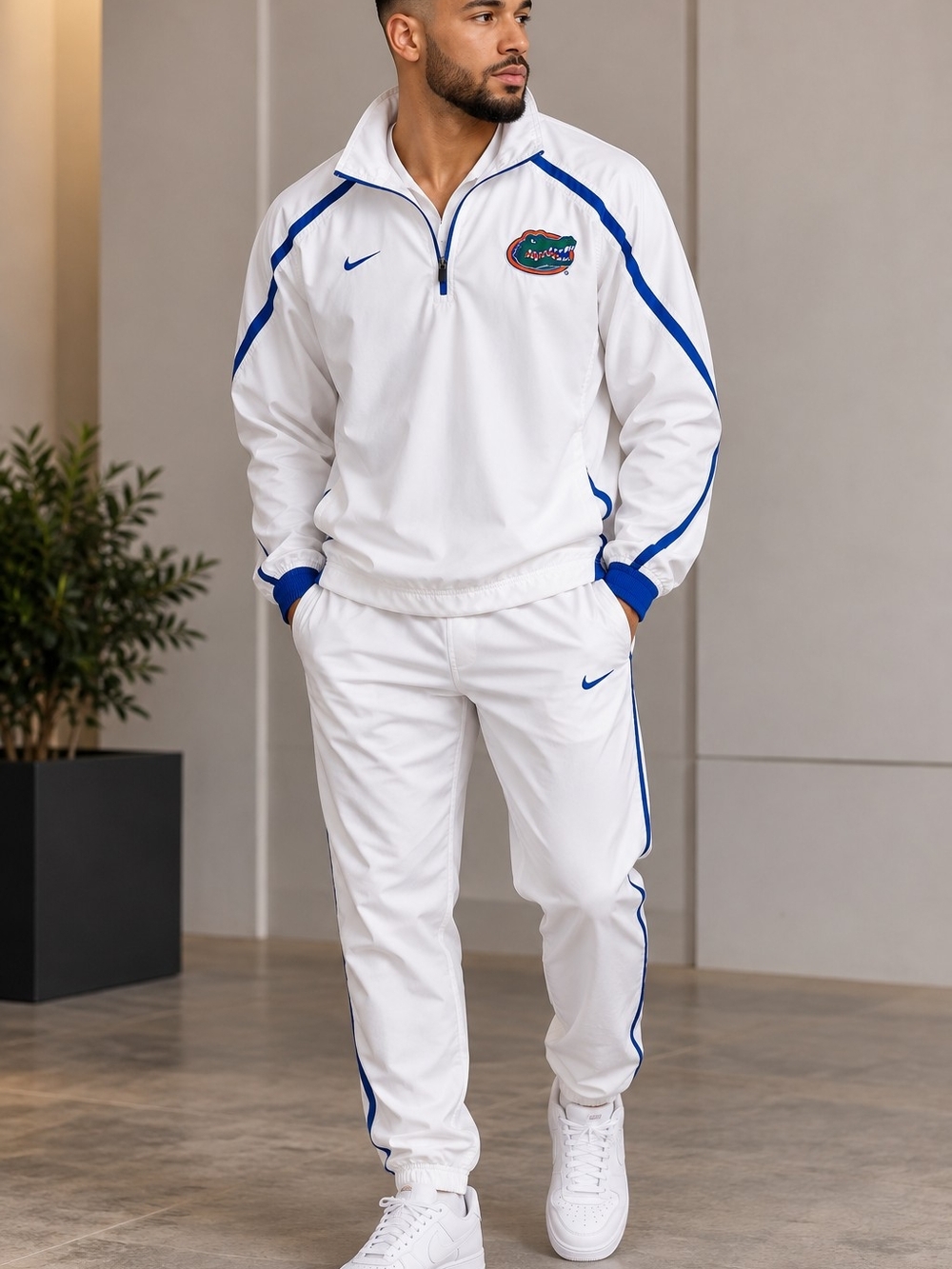 Nike Florida Gators White BluNike Men's White & Royal Blue Half-Zip Track Jacket